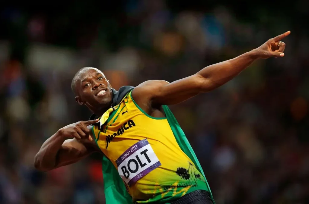 Bolt festeja su récord olímpico en los 100m de Londres 2012